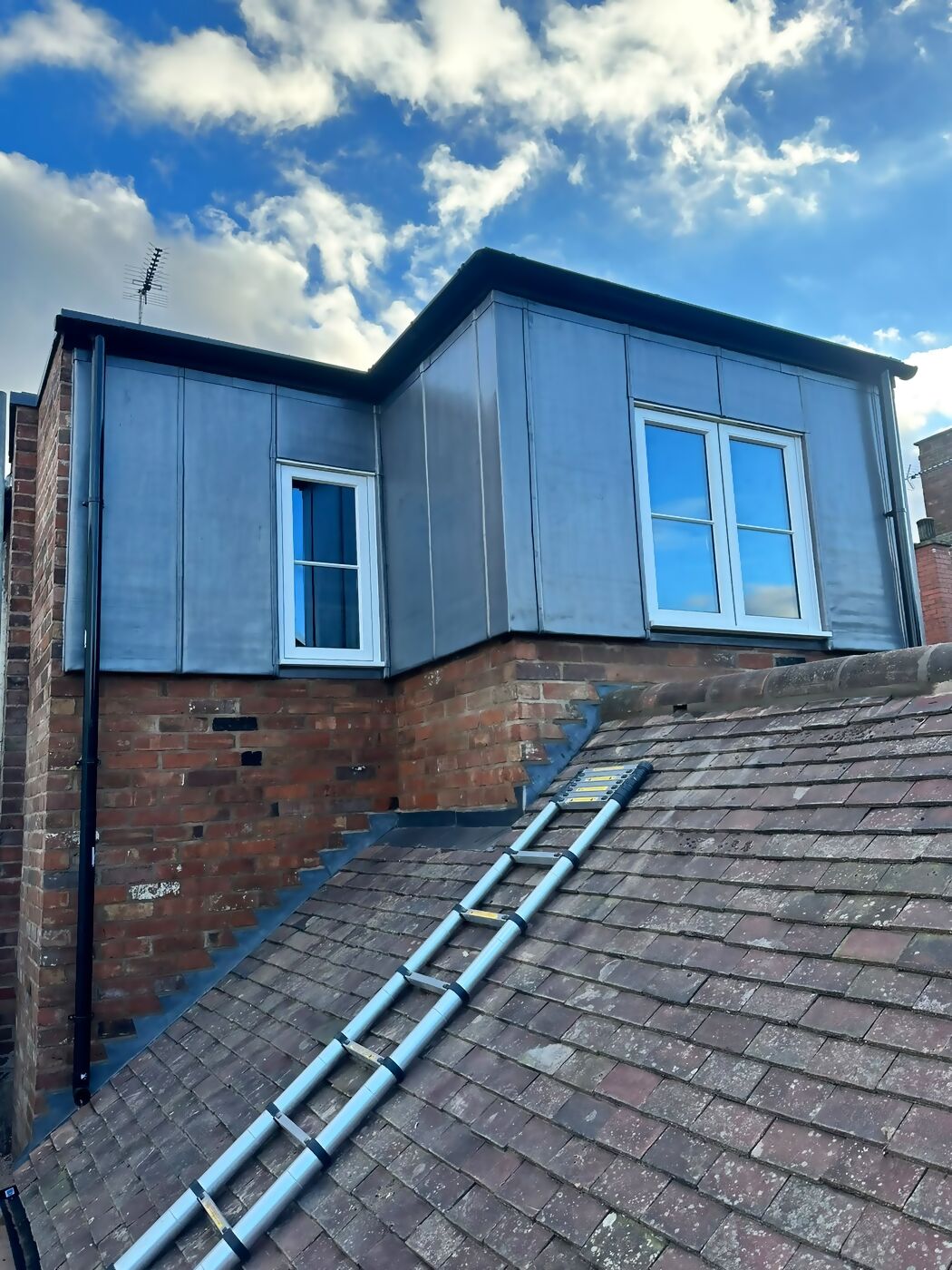 Lead-clad dormers above plain tile roof, Jury Street Warwick