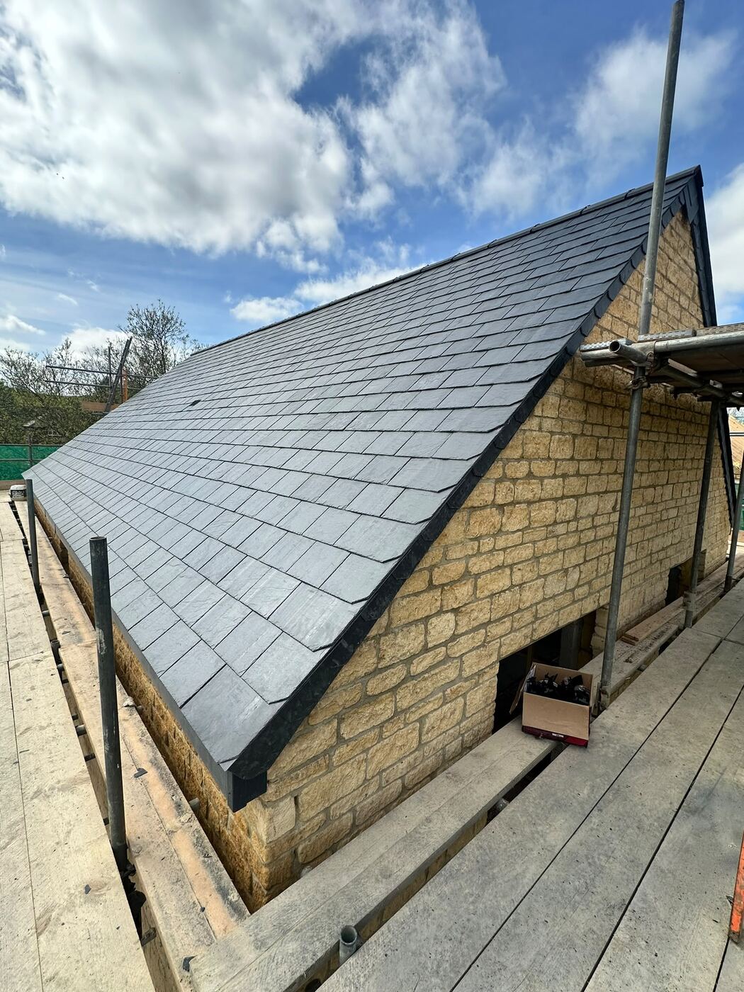 Natural slate gable on stone cottage